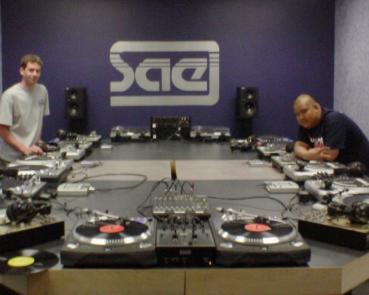 Jay Borland (DJ Jase) and Glenn Barretto (DJ Excess) show off SAE Miami's DJ lab