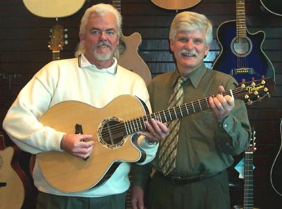 Robert Steele of the Cousteau Society and Paul Damiano of Kaman Music Corp. double up on the LTD-2001