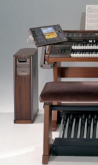 EX-1 beside the organ, display and control panel close to the keyboards